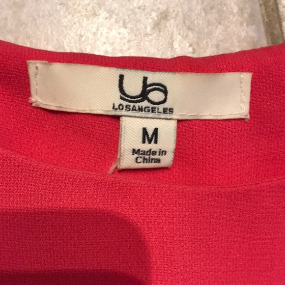 Pink peplum top with open back - Picture 2 of 3